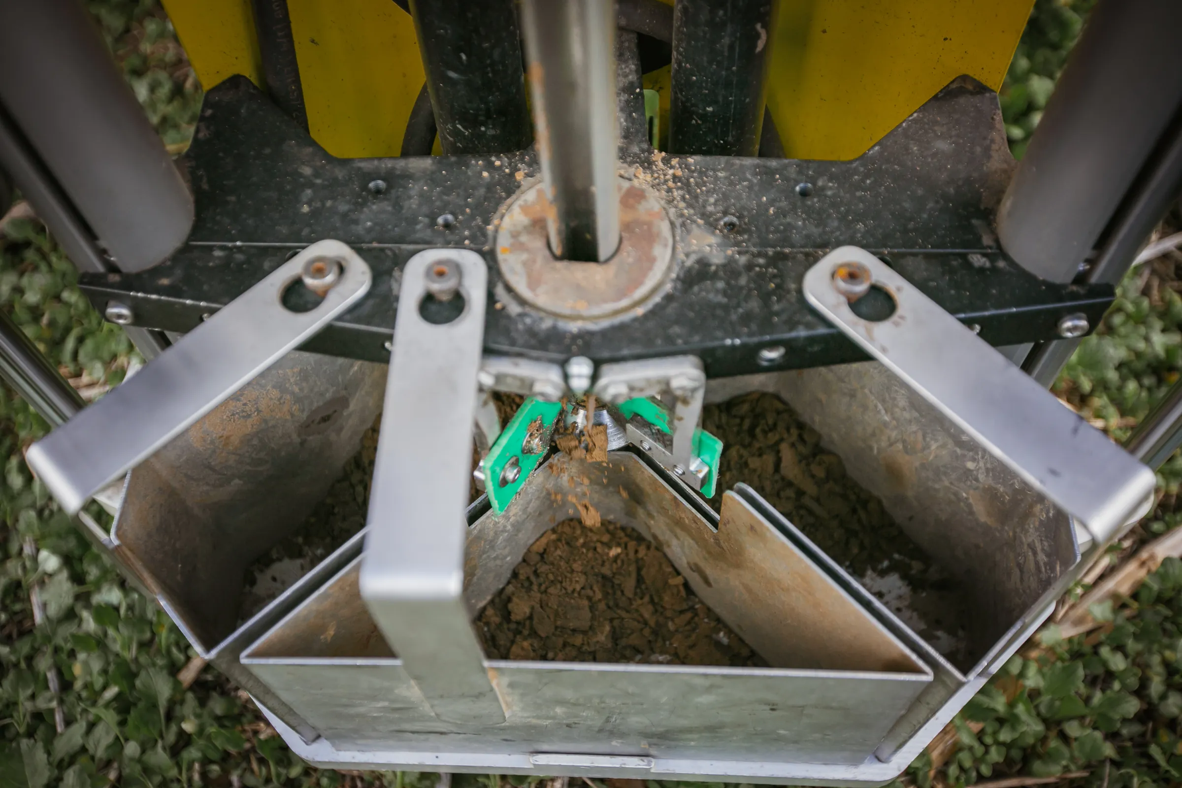The three soil boxes filling with soil